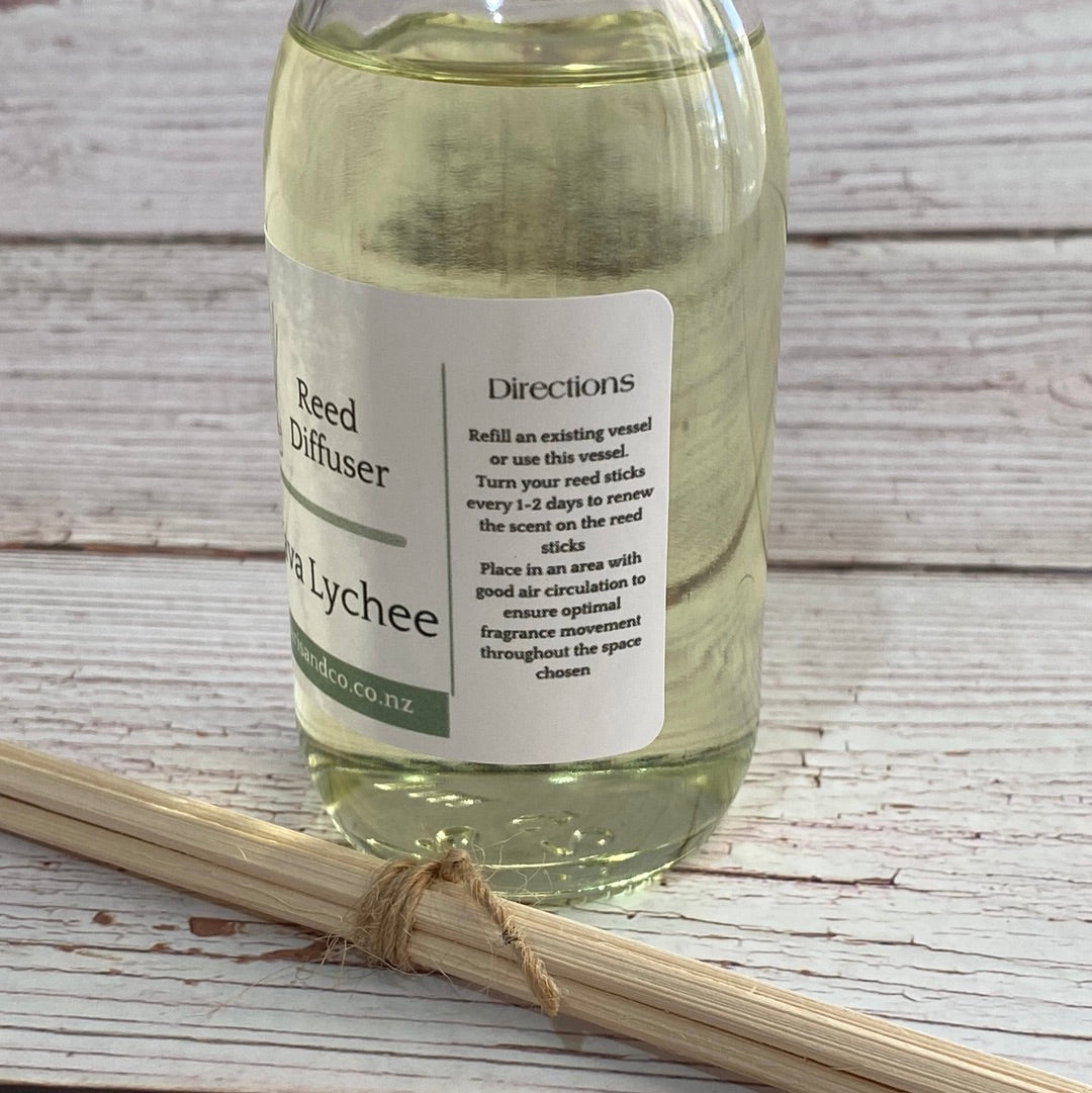 guava and lychee reed diffuser in 125ml glass bottle with reed sticks and directions for use