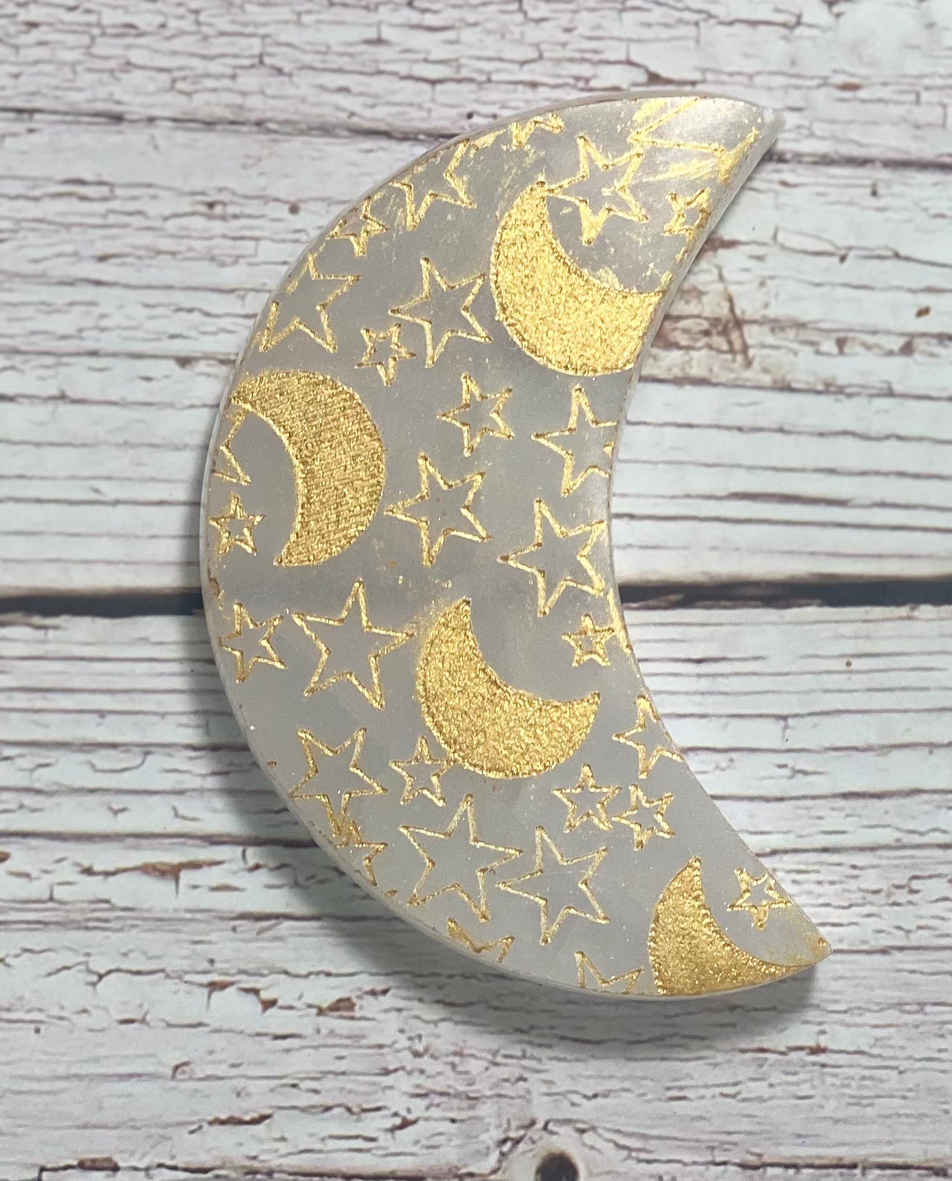 Selenite crescent Moon with engraved gold moons and stars